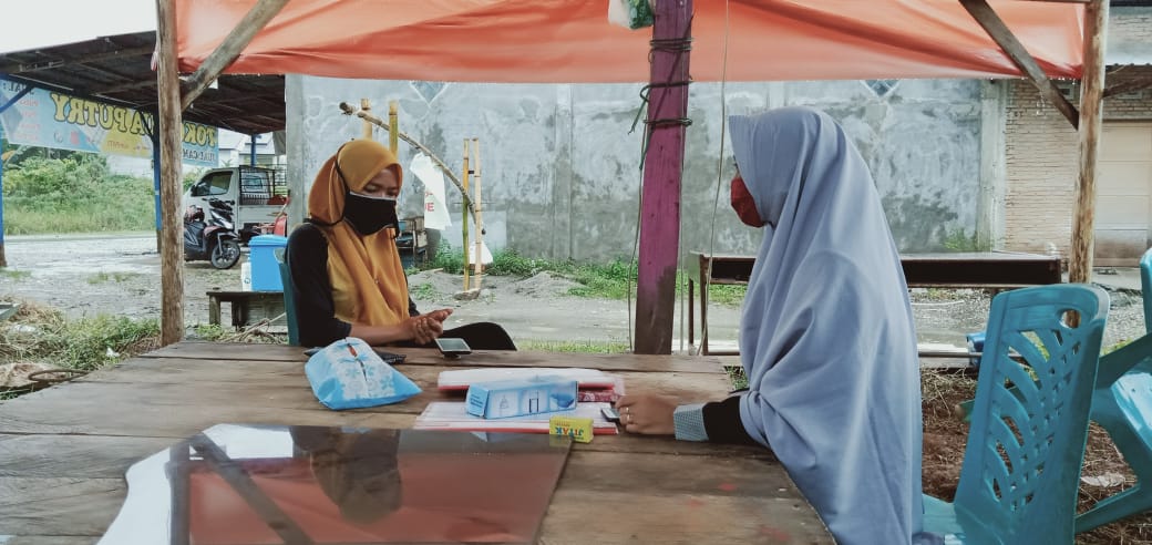 Relawan Desa Atue Tetap Berlakukan Kawasan Wajib Masker