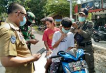 Tripika Kecamatan Wotu Bagikan 550 Masker Kepada Masyarakat