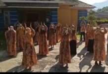 Hari Kesehatan Nasional ke-56, PKM Lampia Lakukan Tepuk Tangan 56 Detik