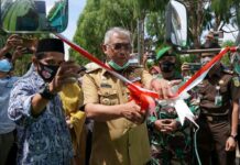 Lepas Logistik Pilkada, Husler Optimis Pilkada Serentak Aman dan Damai