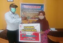Pemdes Lestari Salurkan BLT-DD Tahap Empat Sekaligus Pembagian Vitamin