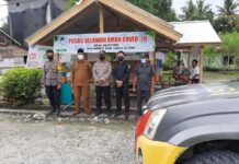 Cek Kelengkapan Posko, Kapolsek Malangke Lakukan Pemantauan Posko PPKM di Desa Benteng