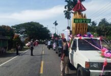 Rombongan Kafilah MTQ IX di Wotu Pawai Keliling