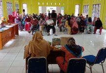 Pemdes Madani Bekerjasama UPT Puskesmas Wotu Gelar Vaksinasi Covid-19