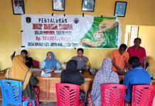 Kantor Pos Wotu Salurkan BLT BBM, BPNT dan PKH di Desa Rinjani