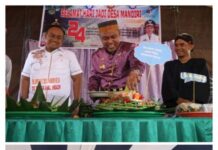 Bupati Budiman Hadiri HUT Desa Mandiri dan Lestari Kecamatan Tomoni
