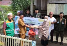 Gandeng Pemdes Wewangriu, DPD Wahdah Islamiyah Lutim Gelar Sedekah Jumat Berkah