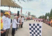 Bupati Luwu Utara Lepas Puluhan Tim Peserta Gerak Jalan Indah di Depan RujabÂ
