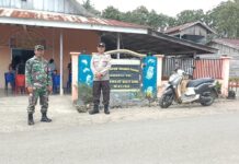 Babinsa dan Babinkamtibmas Pengamanan Ibadah Syukuran Panen di Morut