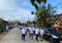 Peringati Hari Buruh Internasional, Kapolres Morowali Utara Jalan Santai Bersama Ratusan Buruh