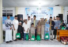 Bupati Luwu Utara Hadiri Buka Puasa Bersama PGRI dan Beri Santunan Kepada Anak Yatim Piatu